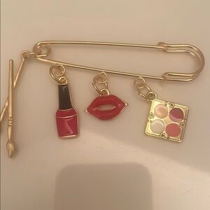 Gold Makeup Charm Brooch